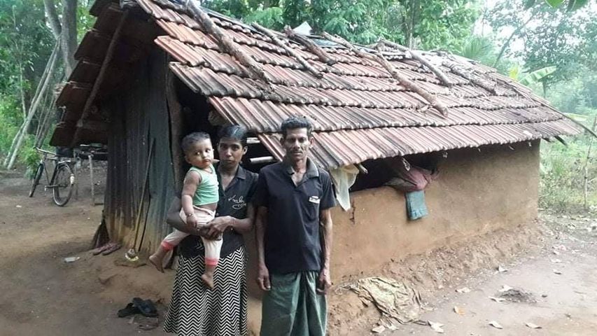 A helpless family in a house about to collapse